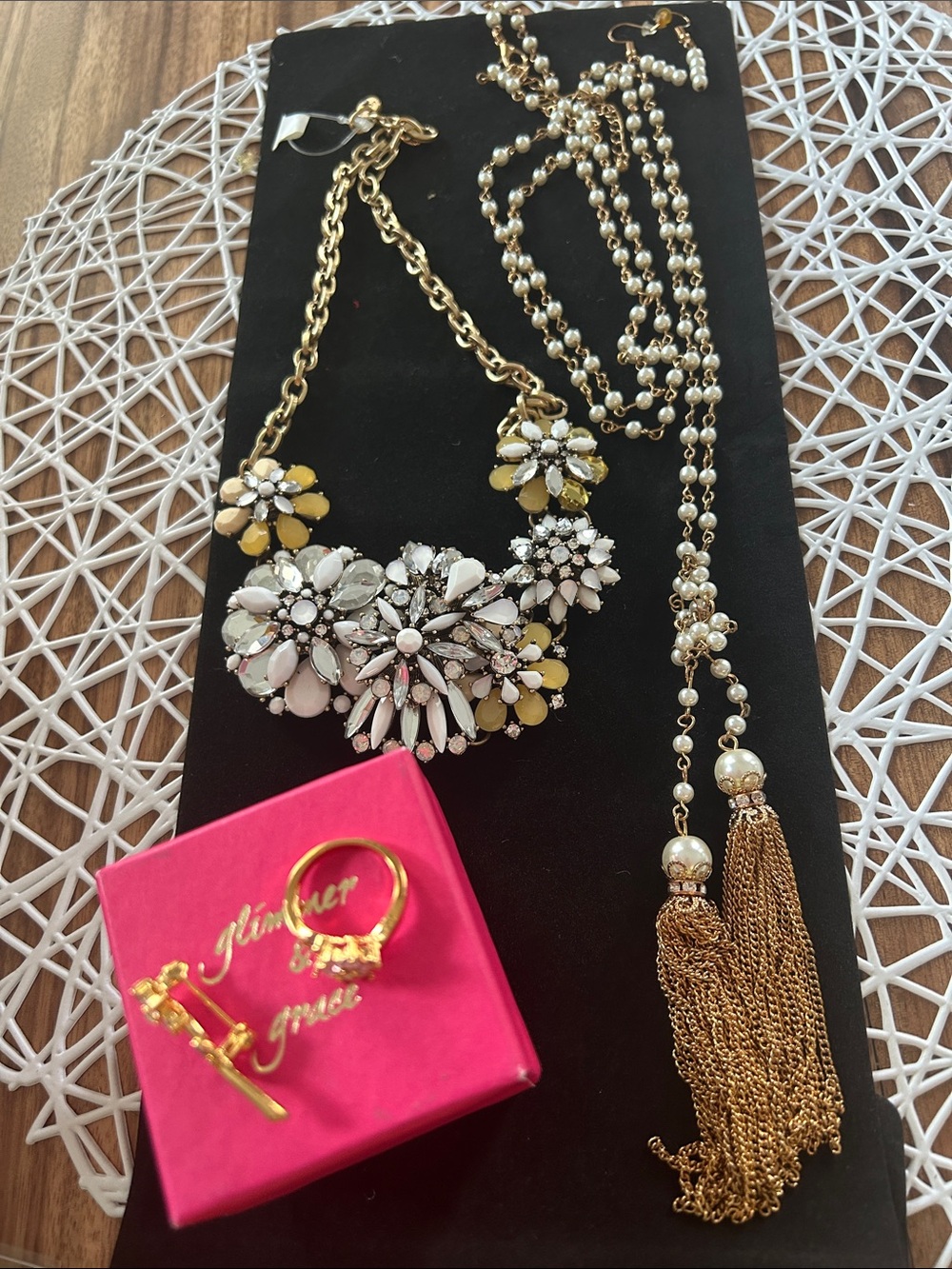 Bundle of 2 necklaces, 1 pair of earrings, 1 pin and ring.